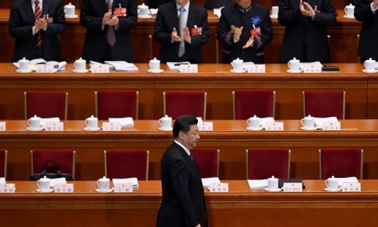 Chủ tịch Trung Quốc Tập Cận Bình đến dự lễ khai mạc Đại hội Đại biểu Nhân dân Toàn quốc tại Đại lễ đường Nhân dân ở Bắc Kinh vào ngày 5 tháng 3 năm 2016 (Ảnh: WANG ZHAO / AFP qua Getty Images)